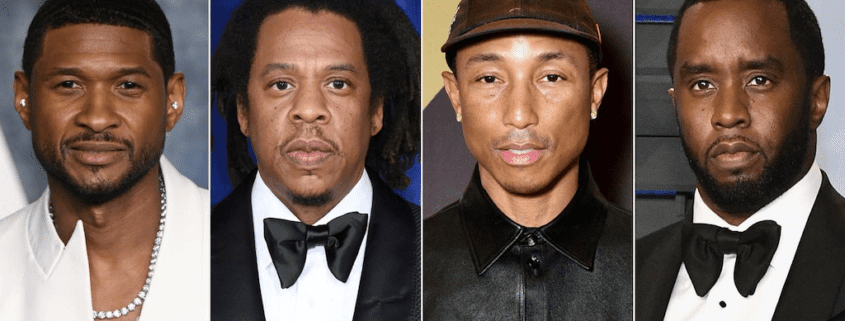 Four men in formal wear, posing.